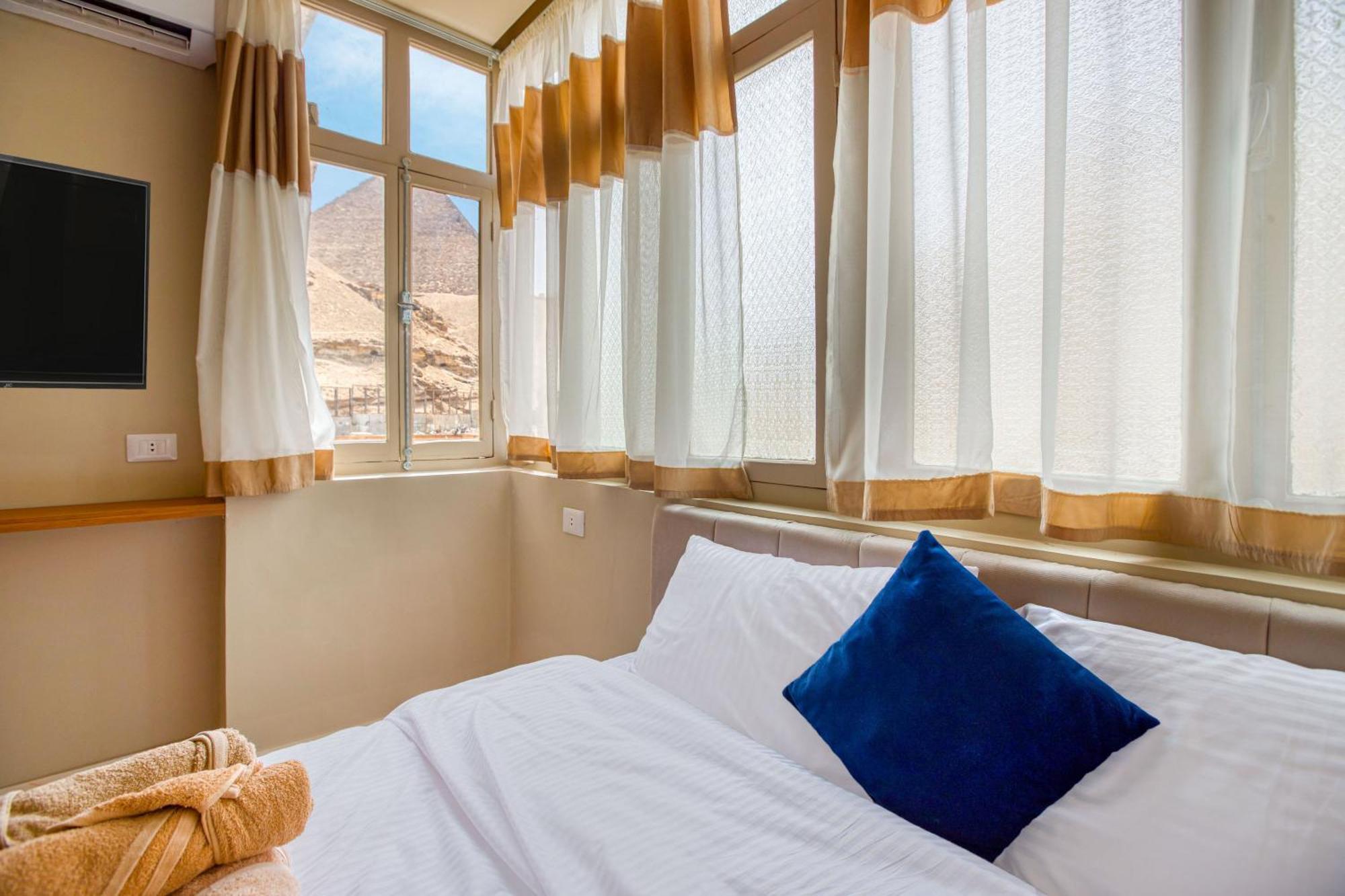 The Grand Pyramids View Hotel Kafret el-Gabal Rom bilde