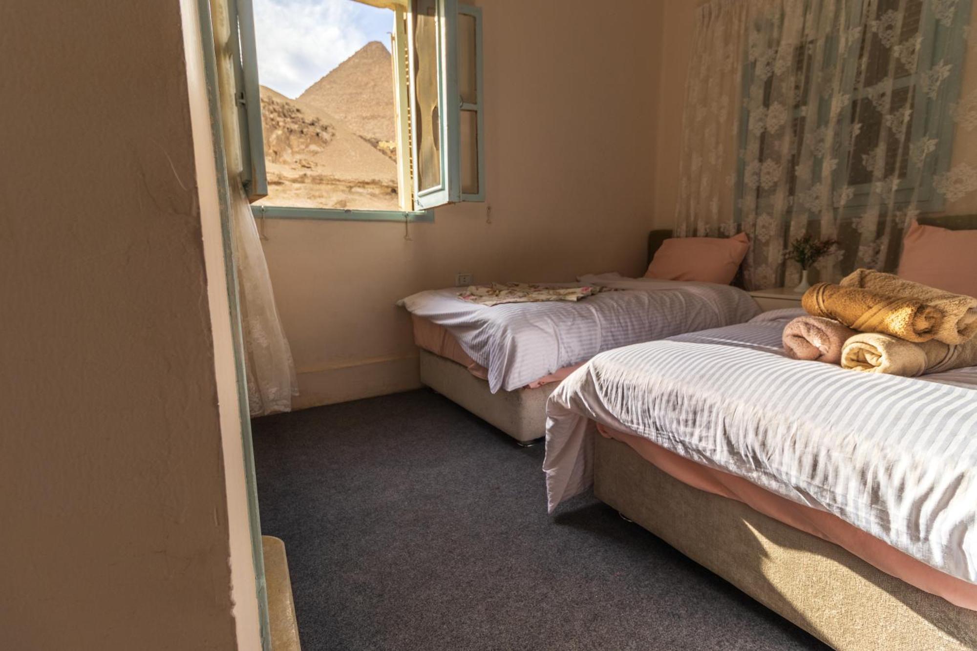 The Grand Pyramids View Hotel Kafret el-Gabal Rom bilde