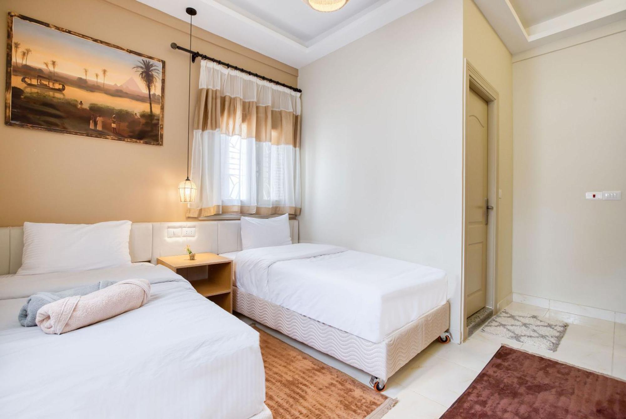 The Grand Pyramids View Hotel Kafret el-Gabal Rom bilde
